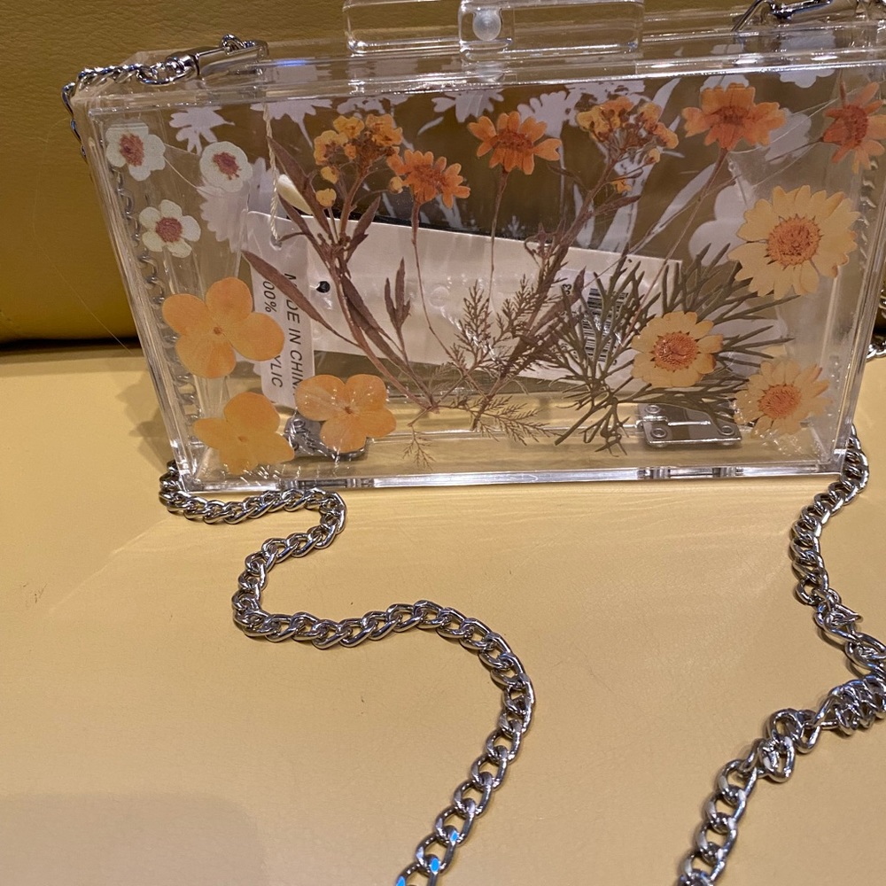 Acrylic purse with a flower motif